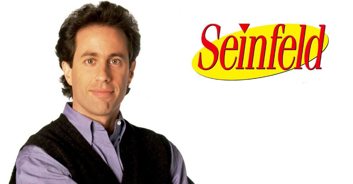 HD Picture of Jerry Seinfeld wearing sweater and full sleeves formal shirt