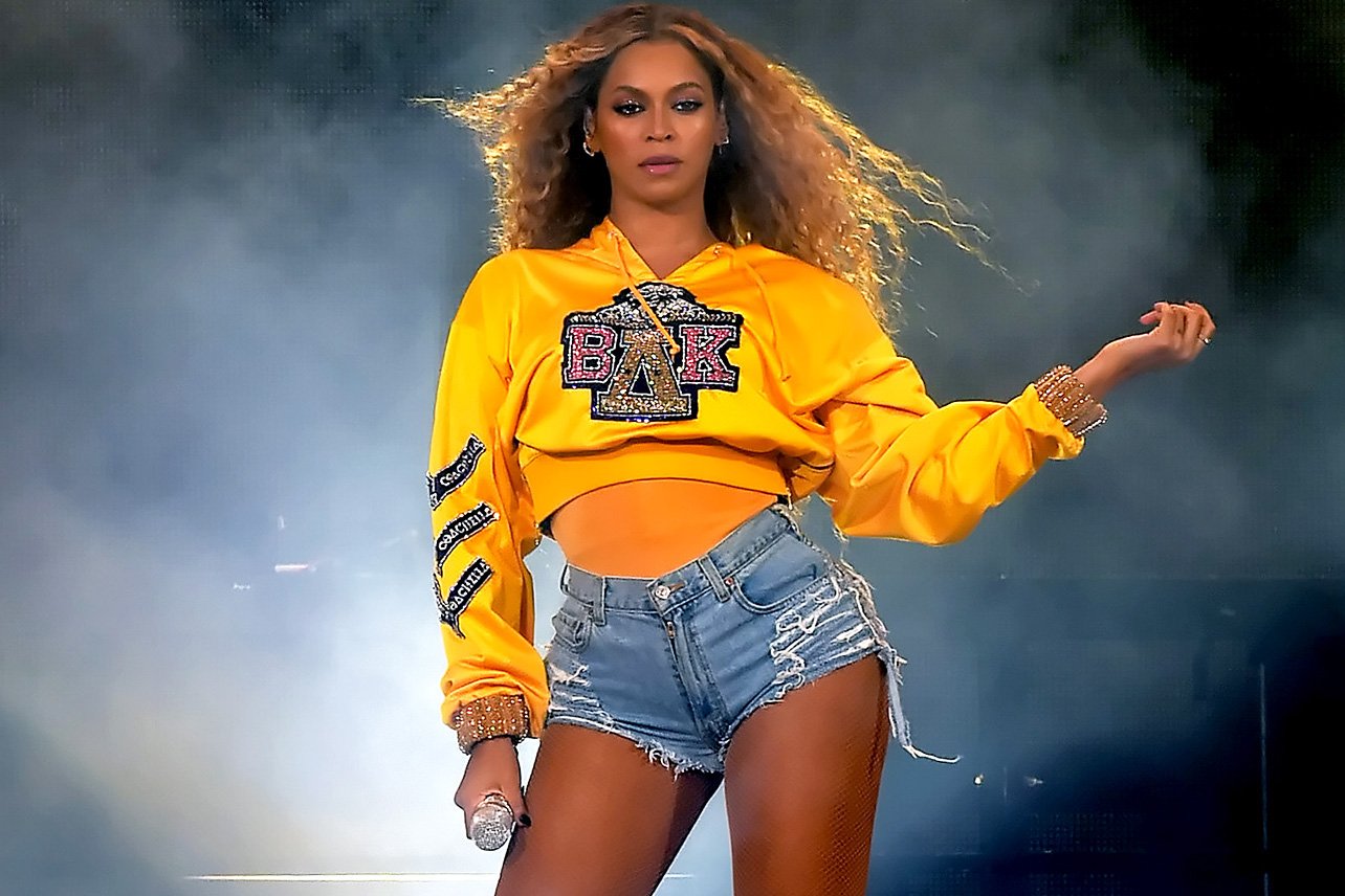 Beyonce Knowles Posing in Elegant Yellow Top